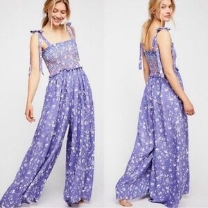 Free People smocked my world jumpsuit w tie straps. Size XS VGUC